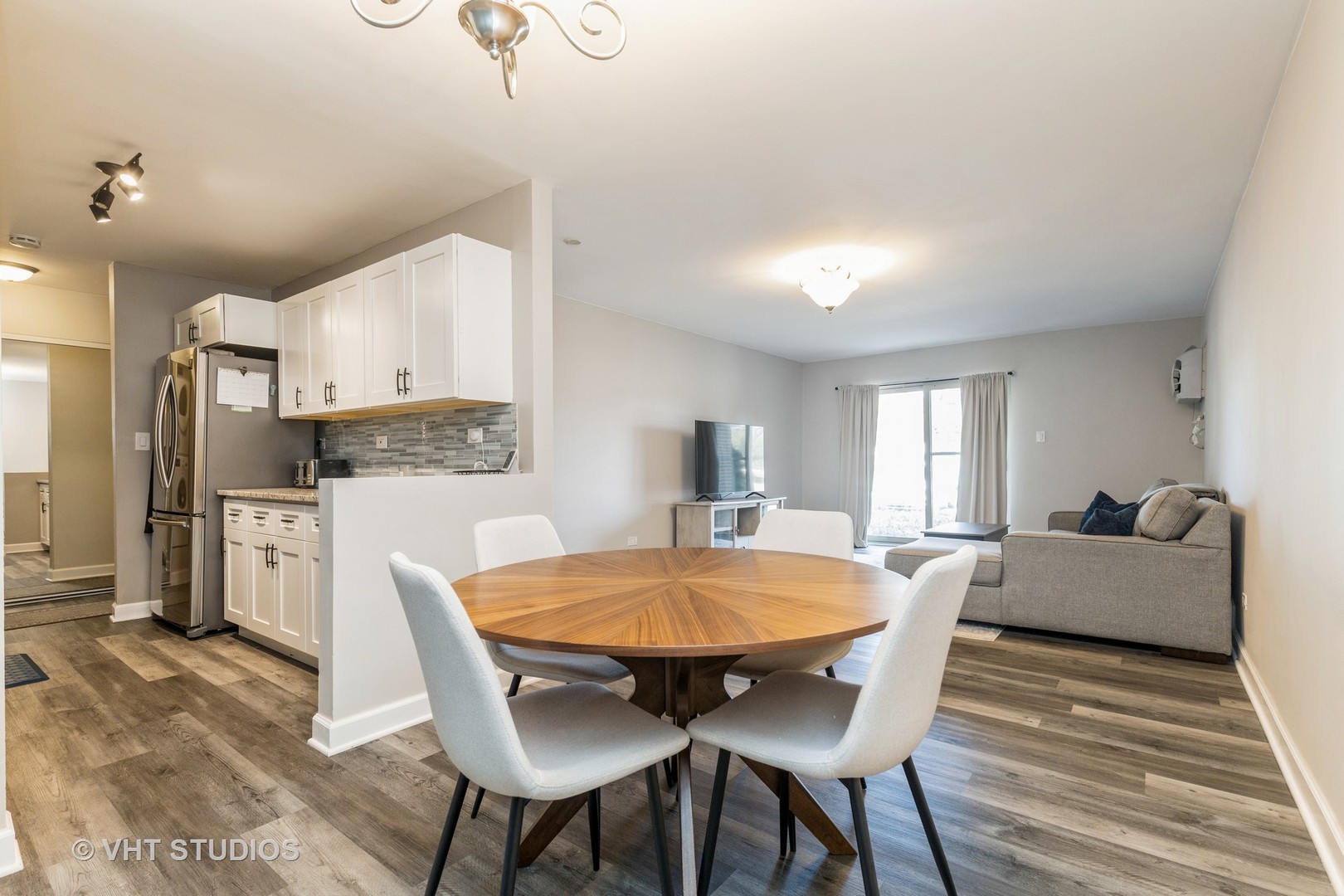 516 North Wilke Road, Unit 106 Palatine, IL 60074 - Photo 11 of 20 a view of a dining room with furniture