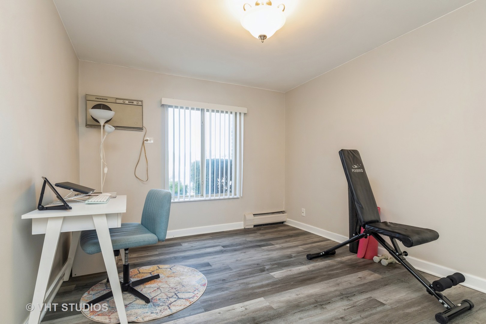 516 North Wilke Road, Unit 106 Palatine, IL 60074 - Photo 16 of 20 a view of a workspace with furniture and a window