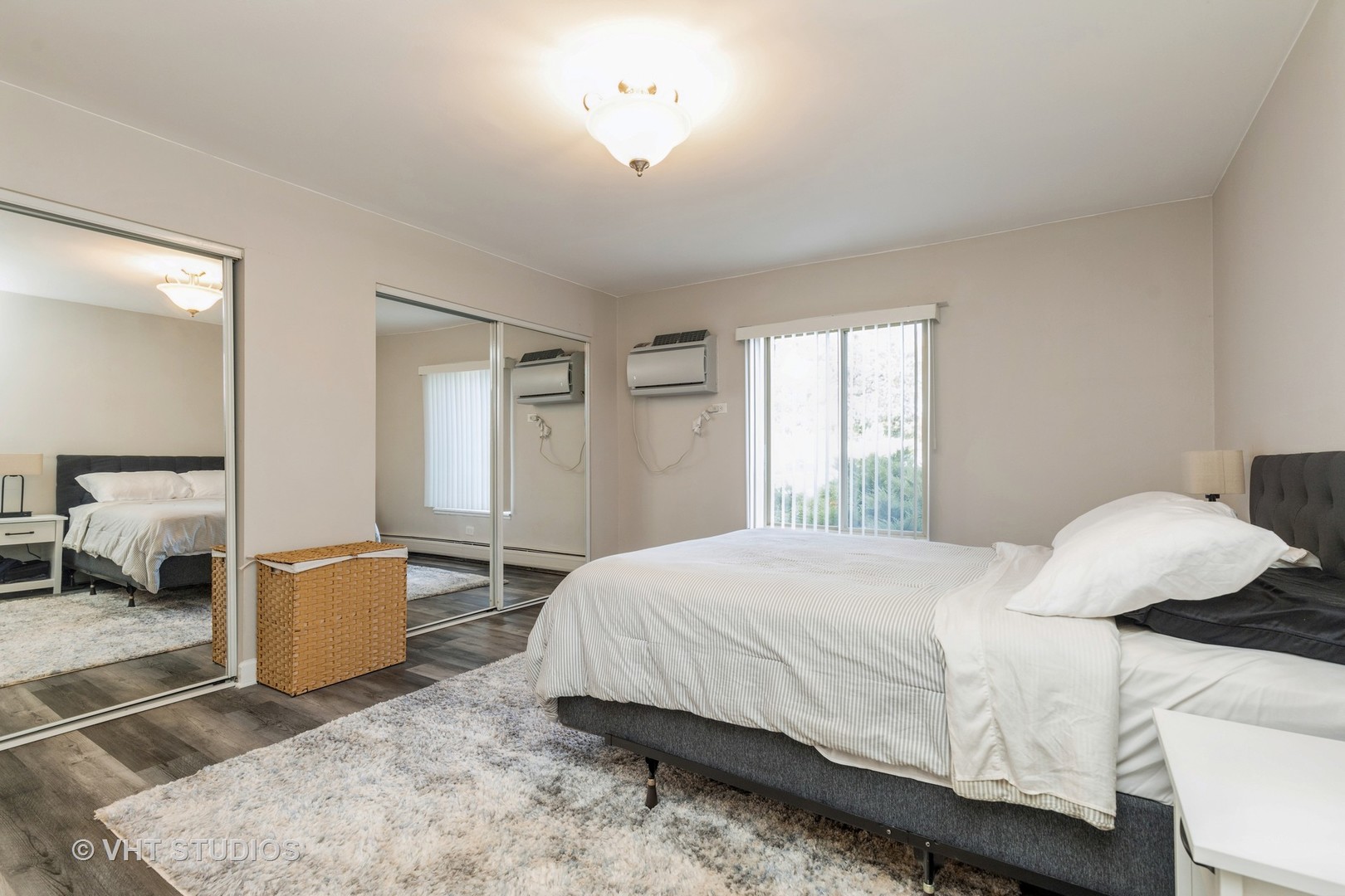 516 North Wilke Road, Unit 106 Palatine, IL 60074 - Photo 18 of 20 a bedroom with a bed and window