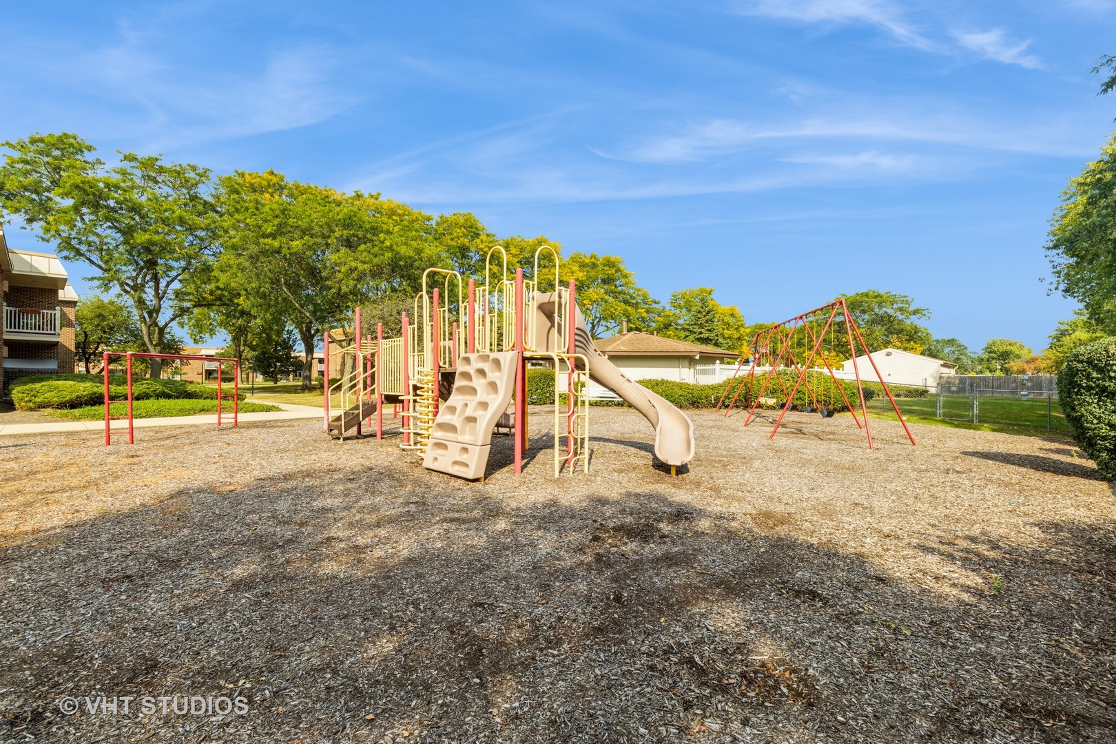 516 North Wilke Road, Unit 106 Palatine, IL 60074 - Photo 2 of 20 a view of a park with large trees