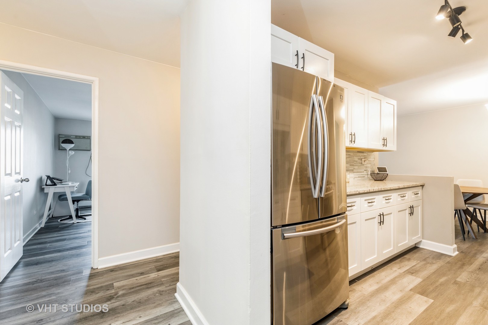 516 North Wilke Road, Unit 106 Palatine, IL 60074 - Photo 4 of 20 a kitchen with stainless steel appliances a refrigerator stove and sink