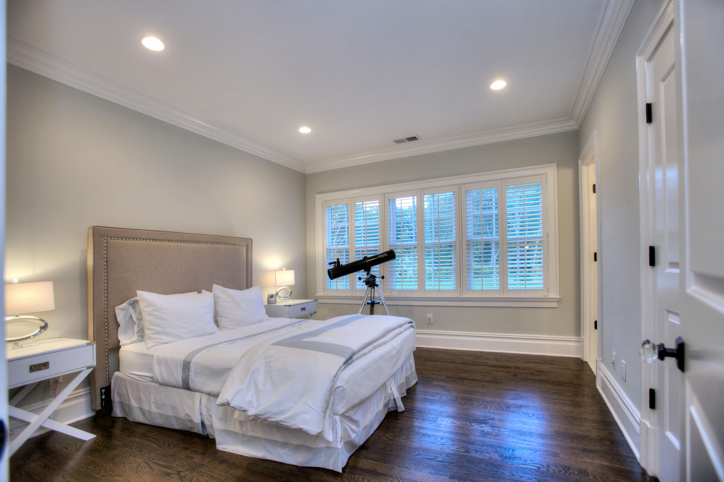 304 Brookside Road Darien, CT 06820 - Photo 15 of 25 a spacious bedroom with a bed and a large window
