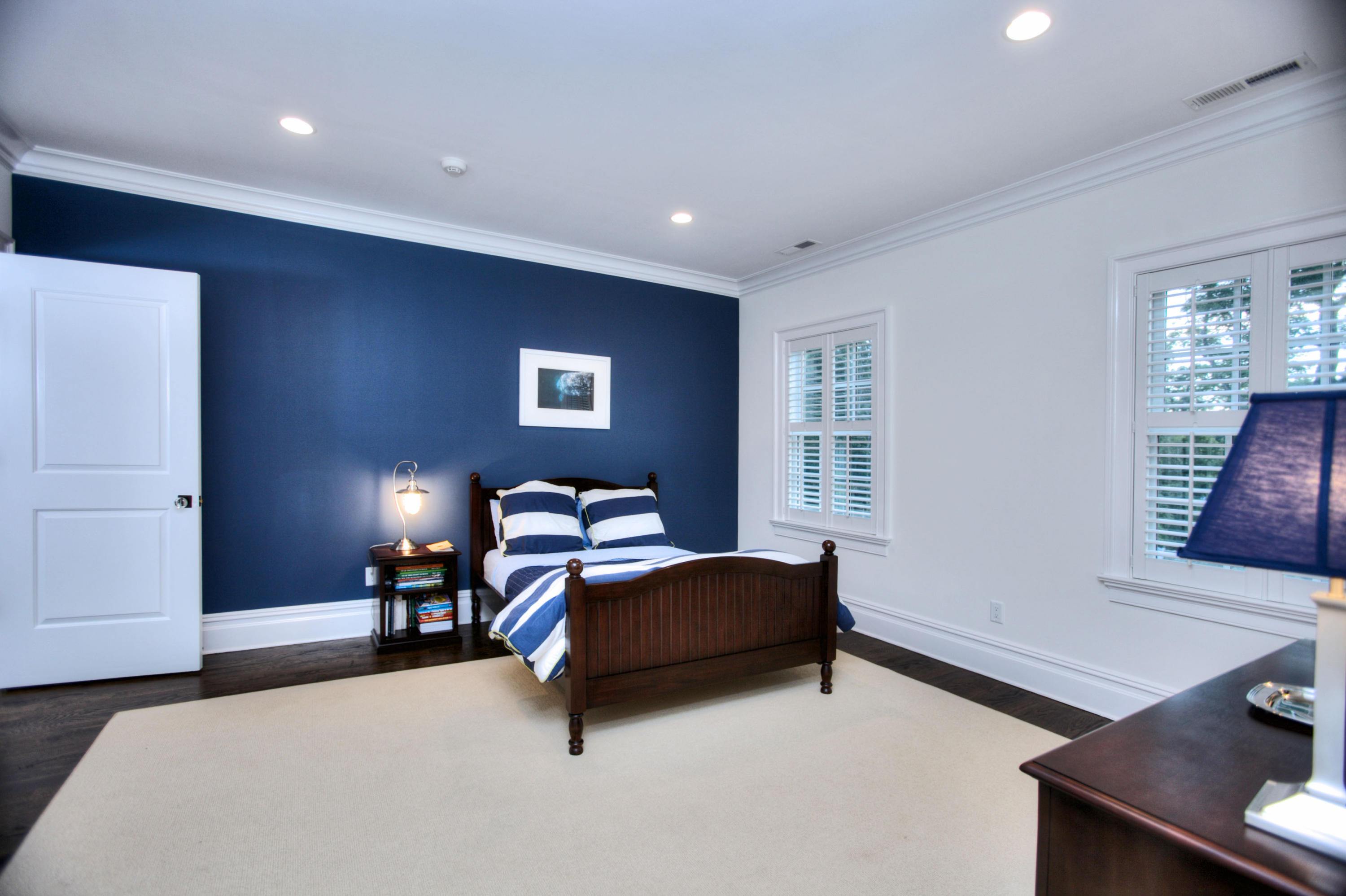 304 Brookside Road Darien, CT 06820 - Photo 17 of 25 a bedroom with furniture and a window