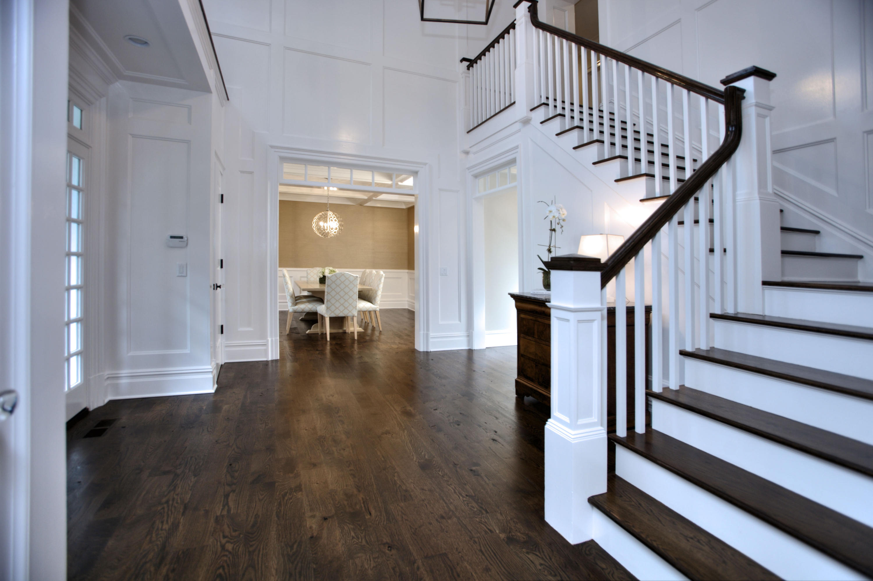 304 Brookside Road Darien, CT 06820 - Photo 2 of 25 a view of entryway with wooden floor and stairs