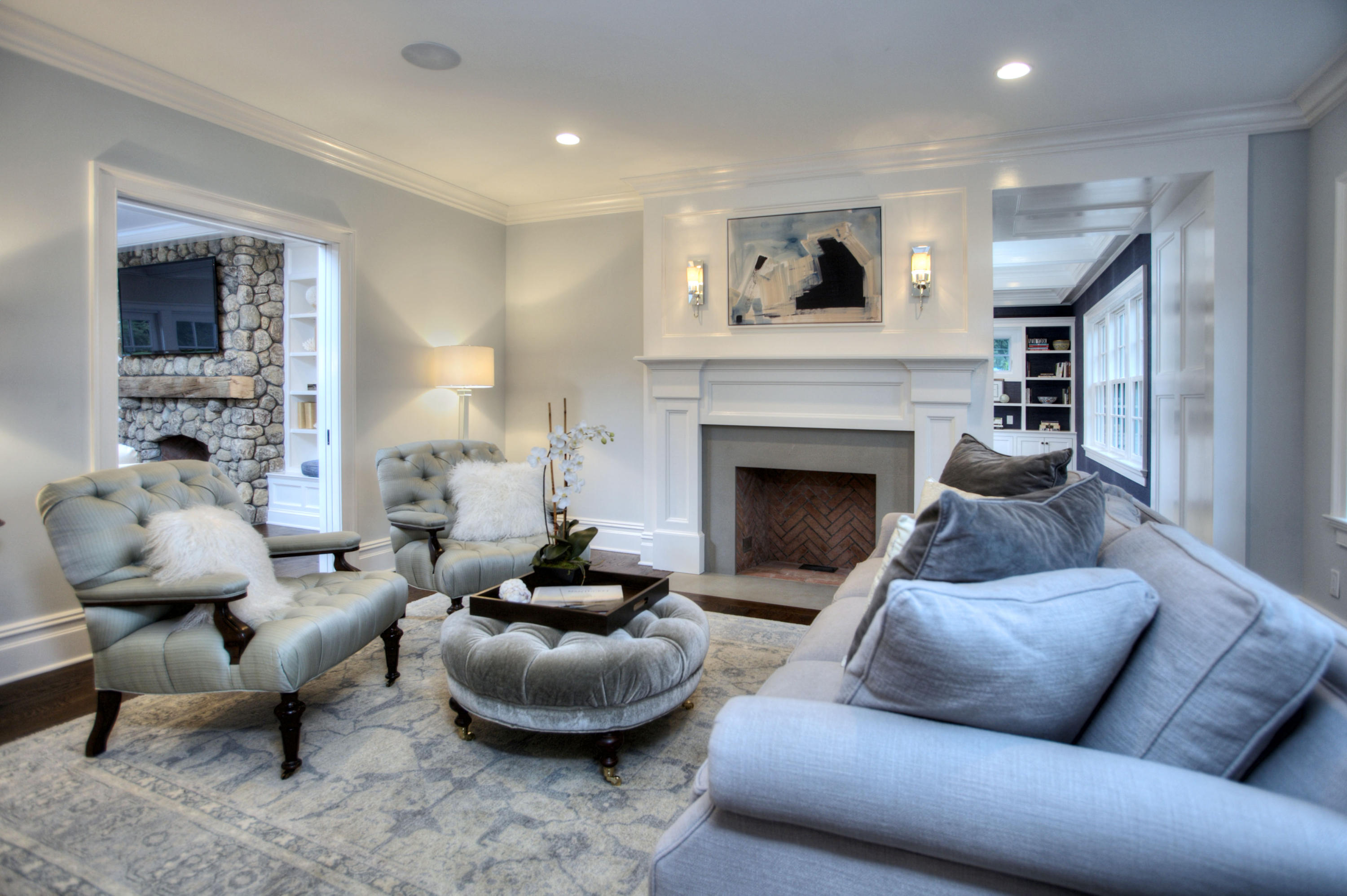 304 Brookside Road Darien, CT 06820 - Photo 3 of 25 a living room with furniture and a fireplace