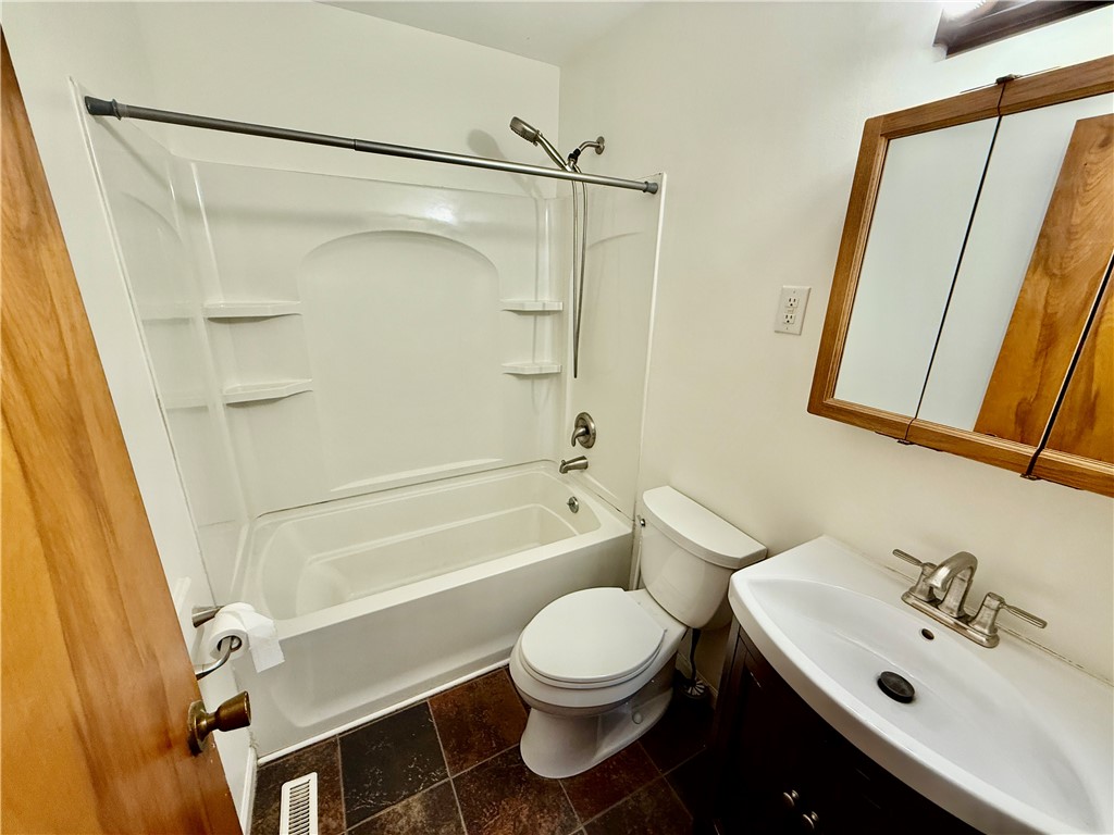 127 Isabella Drive Decatur, IL 62521 - Photo 11 of 16 a bathroom with a sink toilet and shower