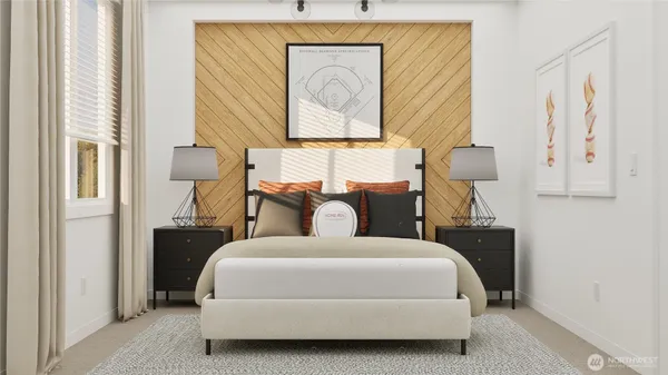 a bedroom with a bed and a painting on the wall