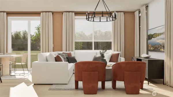 a living room with furniture and a window