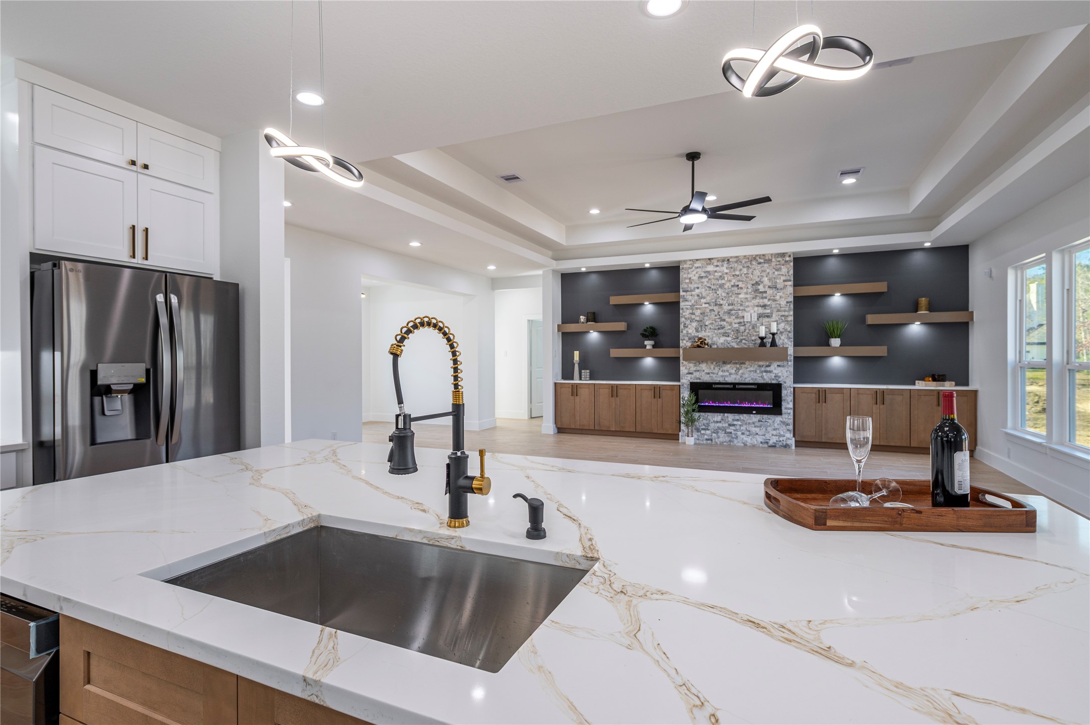 a kitchen with a sink appliances and a counter top space