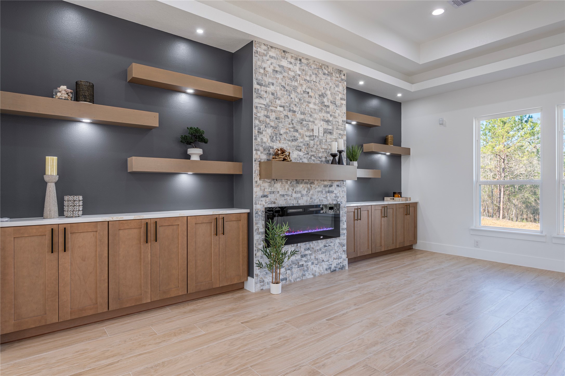 352 County Road 6490 Dayton, TX 77535 - Photo 12 of 45 a living room with furniture and a fireplace