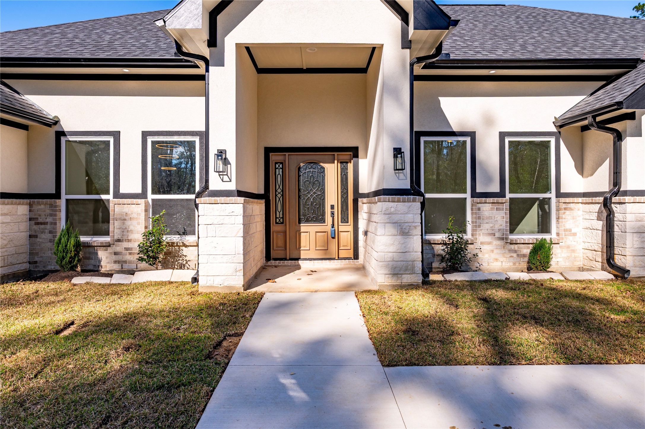 352 County Road 6490 Dayton, TX 77535 - Photo 2 of 45 a view of a house with large door