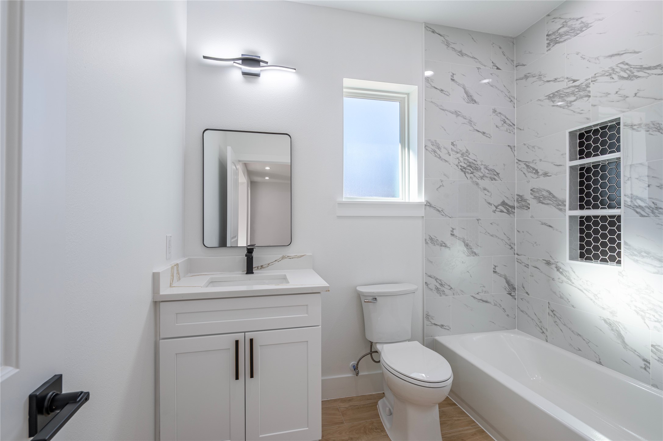 352 County Road 6490 Dayton, TX 77535 - Photo 22 of 45 a bathroom with a sink toilet and shower