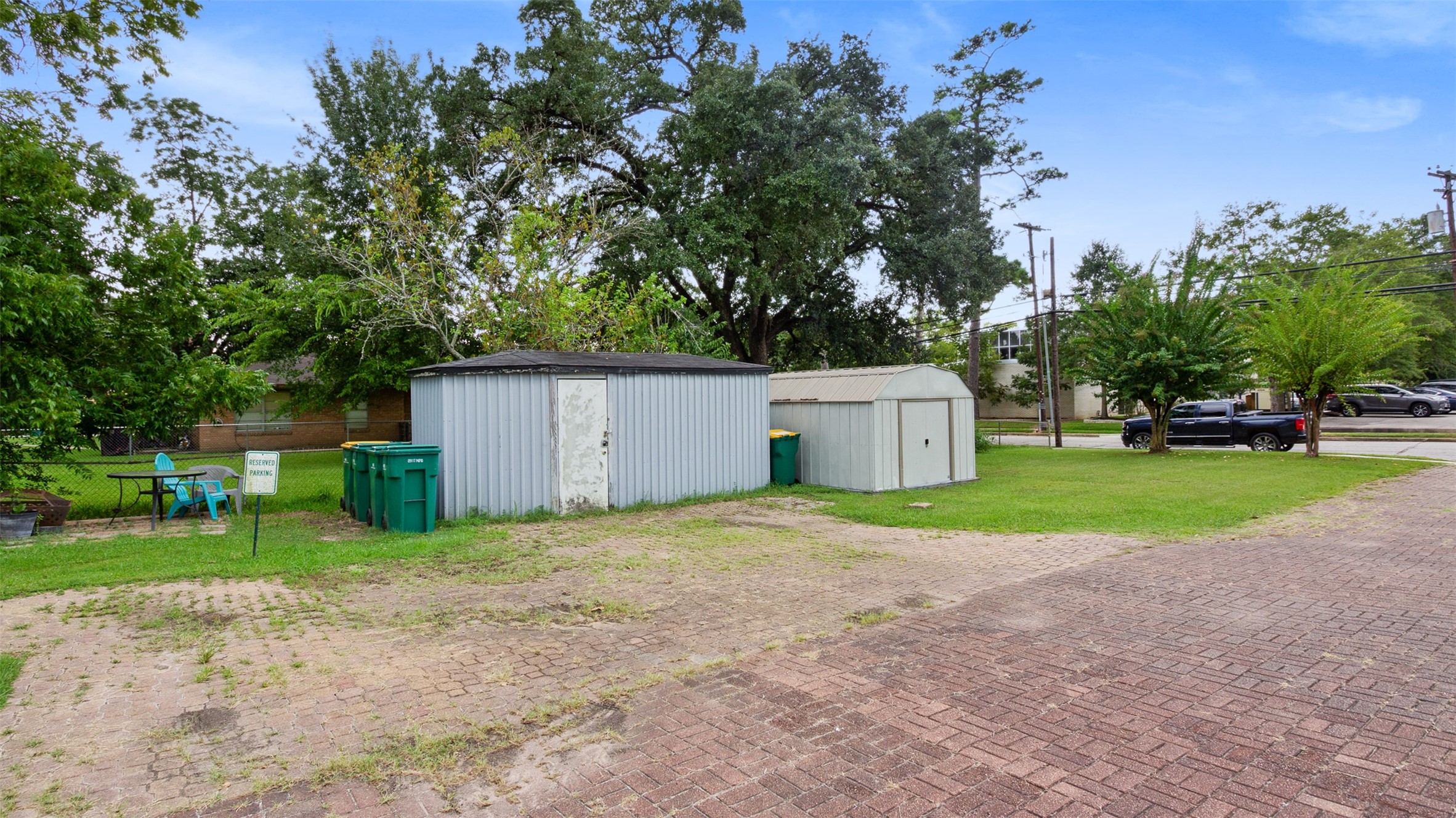 317 West Lewis Street Conroe, TX 77301 - Photo 16 of 30 a house with trees in front of it