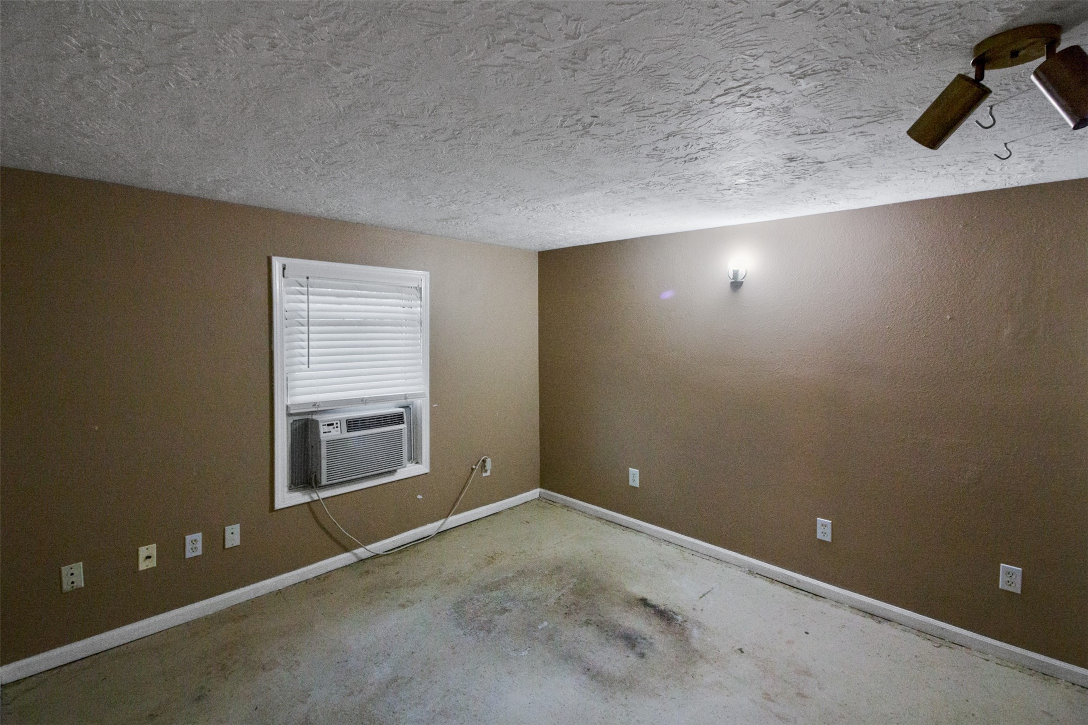 317 West Lewis Street Conroe, TX 77301 - Photo 21 of 30 an empty room with windows