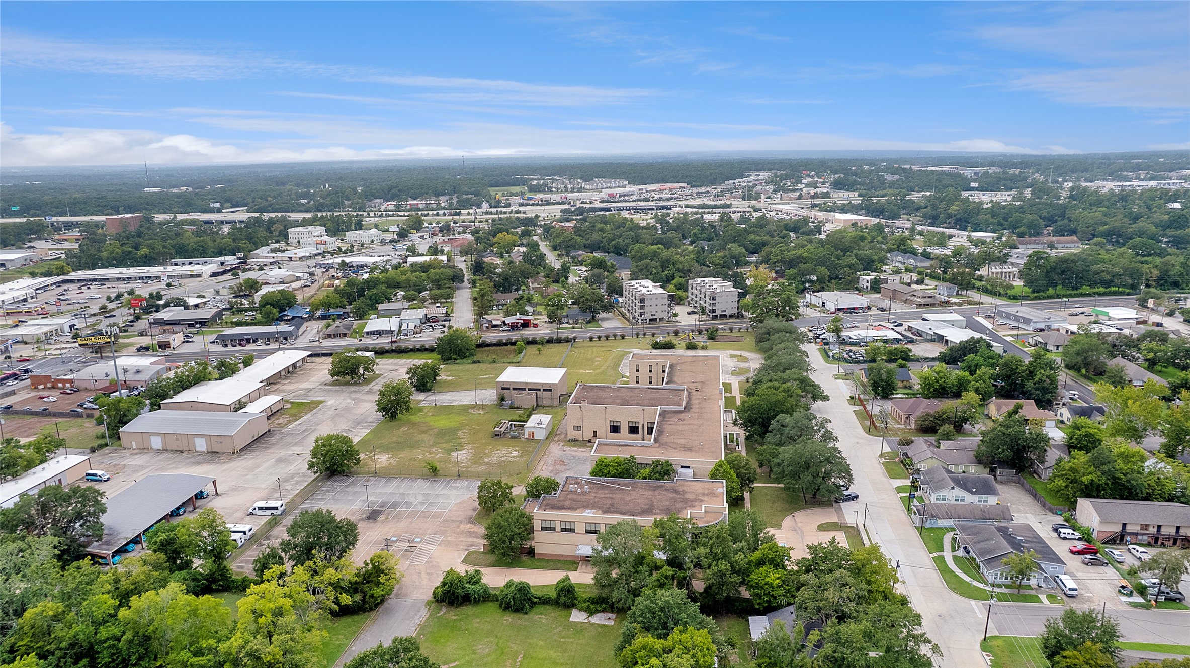 317 West Lewis Street Conroe, TX 77301 - Photo 3 of 30 an aerial view of residential houses with outdoor space