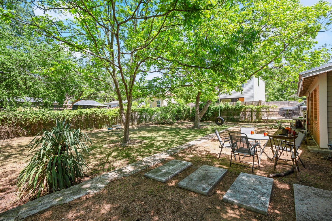 4606 South 2nd Street Austin, TX 78745 - Photo 6 of 24 a view of backyard with seating area and green space