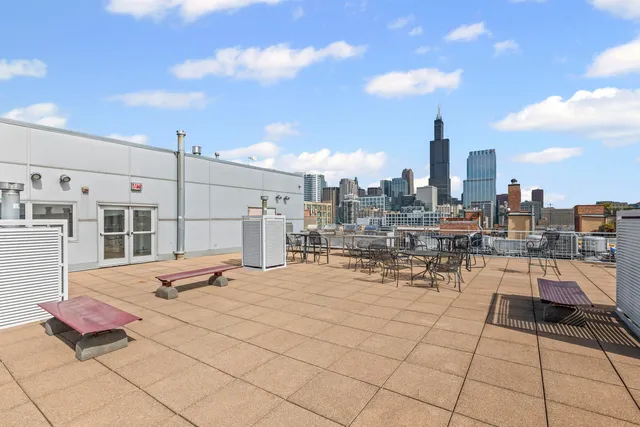 a view of roof deck with seating space