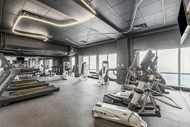 a gym room with gym equipment