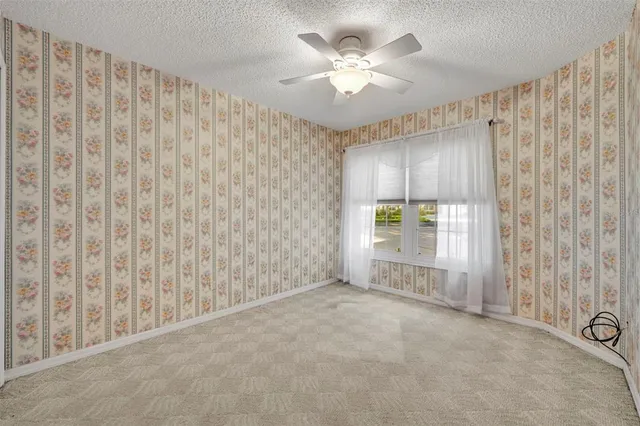 front view of a house with a garden