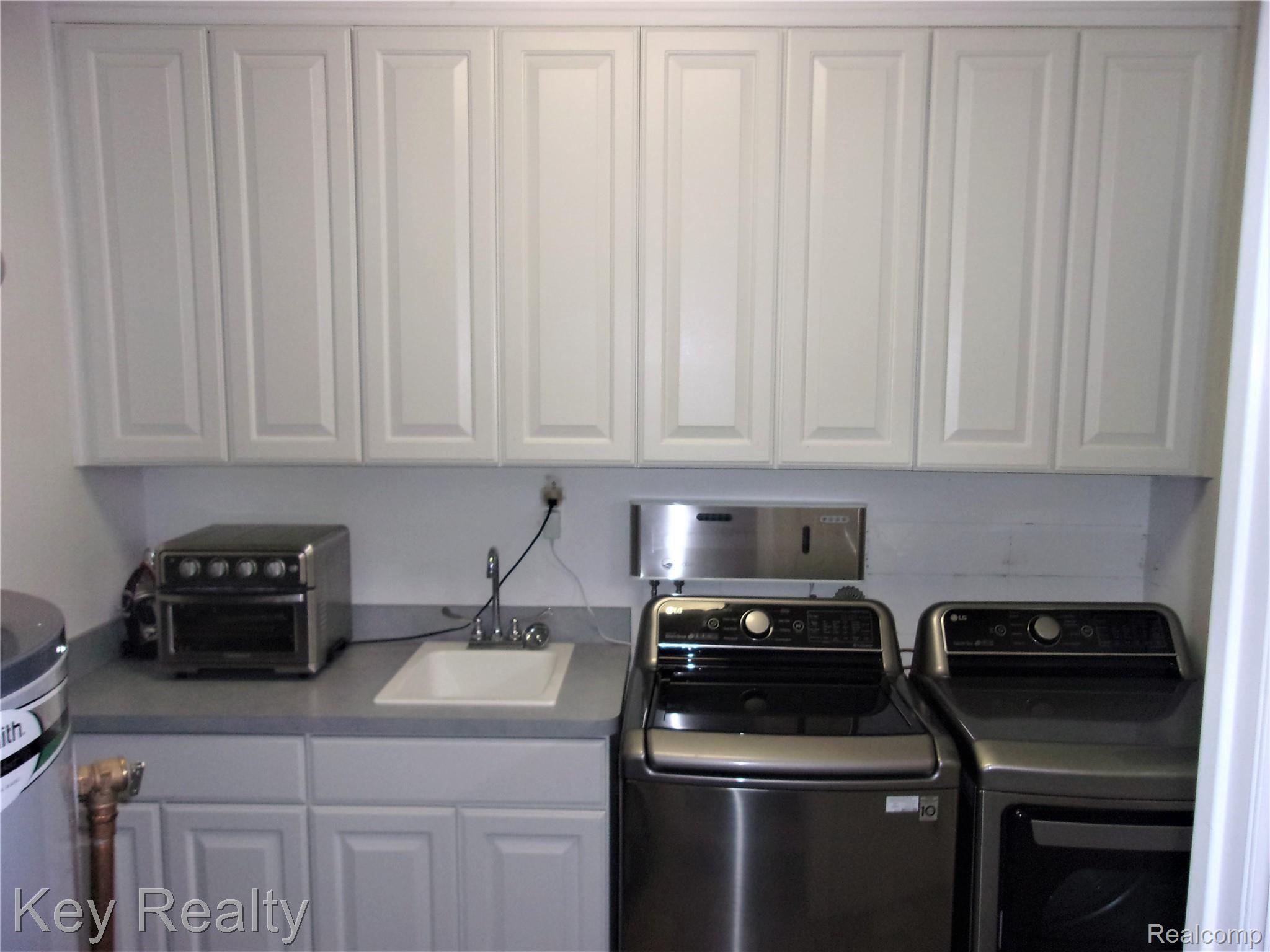 19131 Hannan Road New Boston, MI 48164 - Photo 28 of 57 HOME LAUNDRY