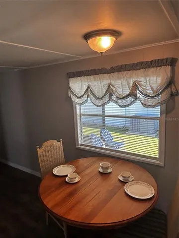 a room with furniture and a wooden floor