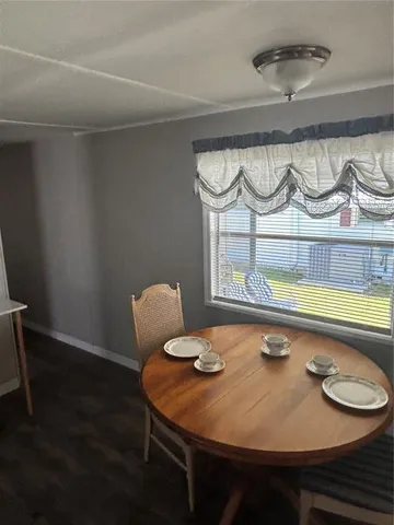 a table and chairs in a room