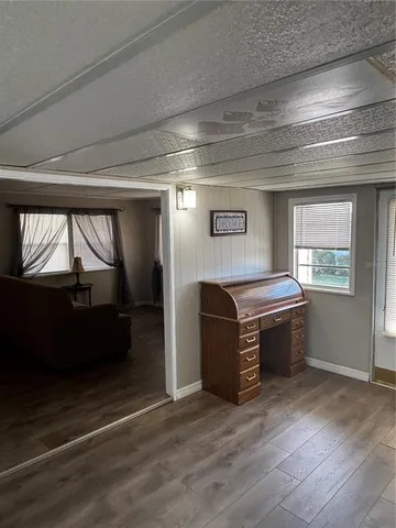 a room with furniture and window