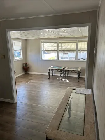 a living room with furniture and a table