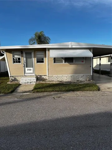 a front view of a house with a garage