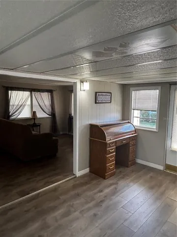 a view of a livingroom with a furniture