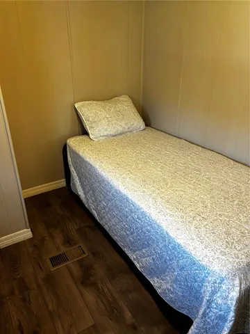 a bedroom with a bed