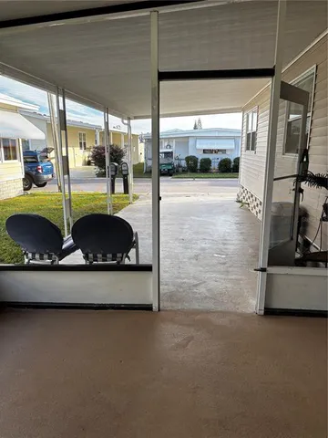 a living room with hard wood floor