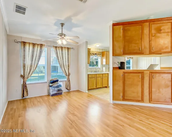 a view of an empty room with a window