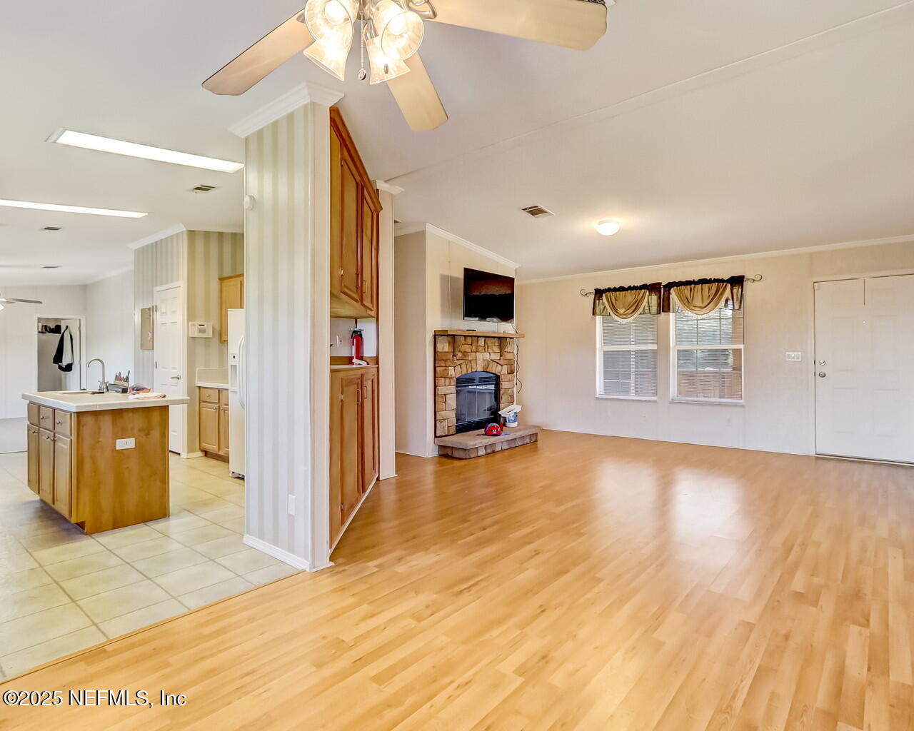 5891 Sequoia Road Keystone Heights, FL 32656 - Photo 13 of 53 a view of a livingroom with a fireplace