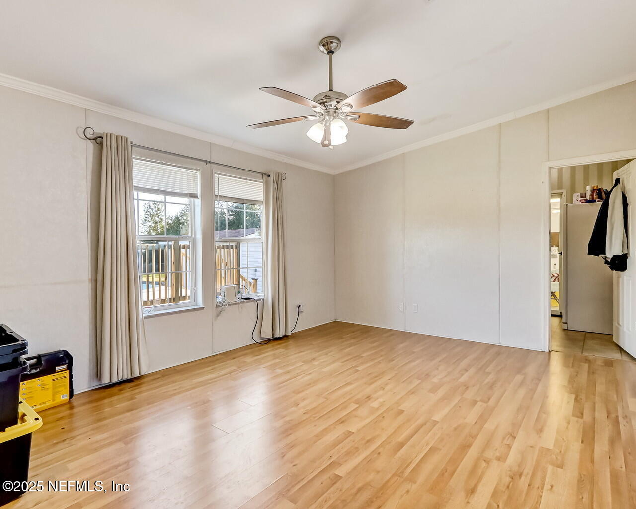5891 Sequoia Road Keystone Heights, FL 32656 - Photo 22 of 53 a view of empty room with wooden floor and fan