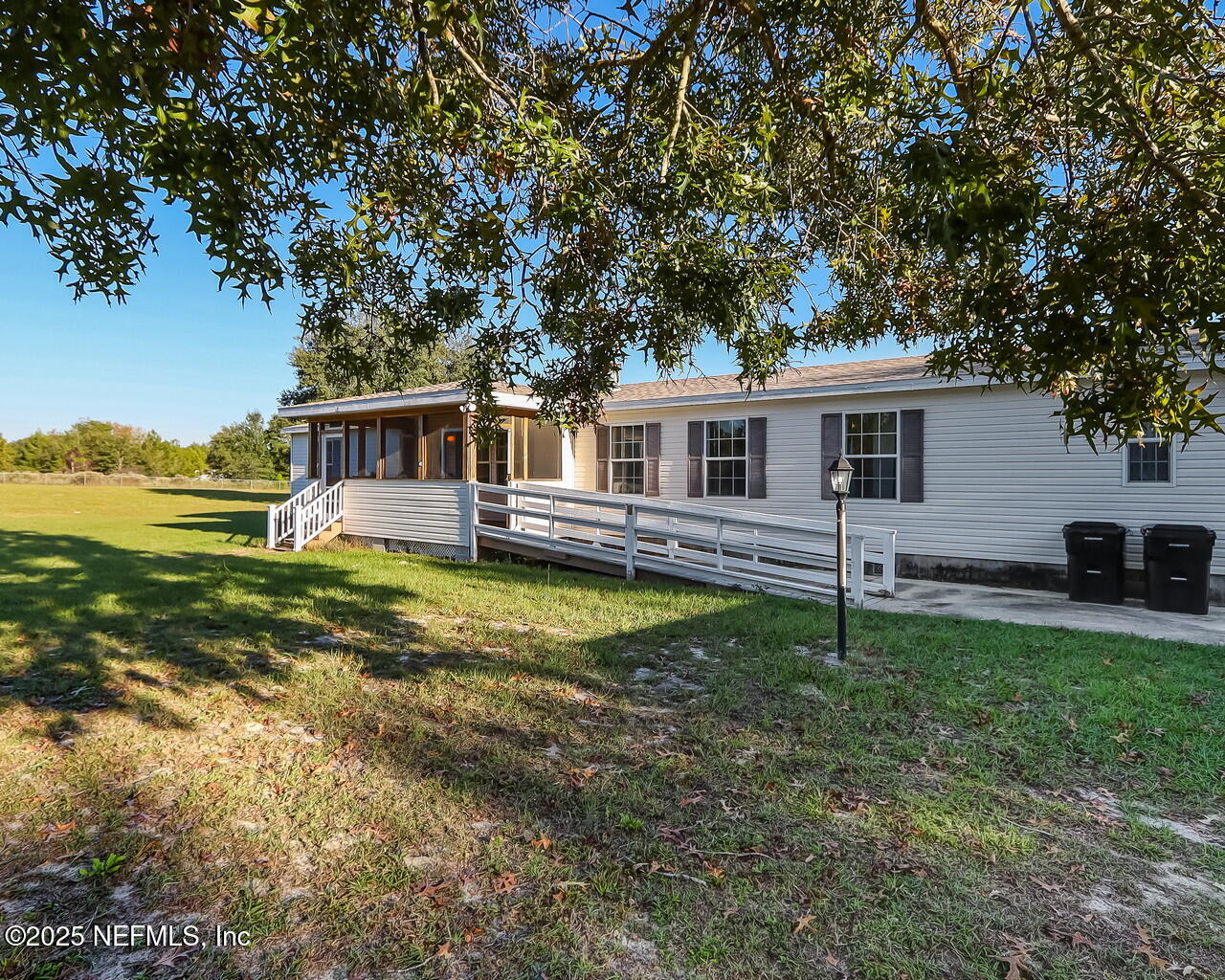 5891 Sequoia Road Keystone Heights, FL 32656 - Photo 3 of 53 a view of a house with pool and sitting area