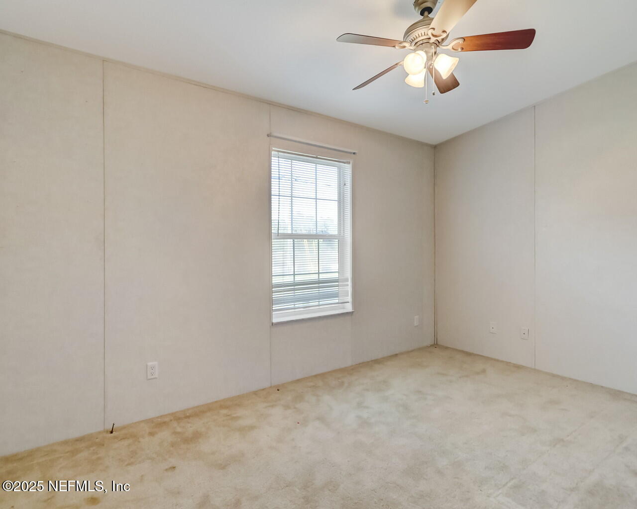 5891 Sequoia Road Keystone Heights, FL 32656 - Photo 39 of 53 a view of an empty room with a window