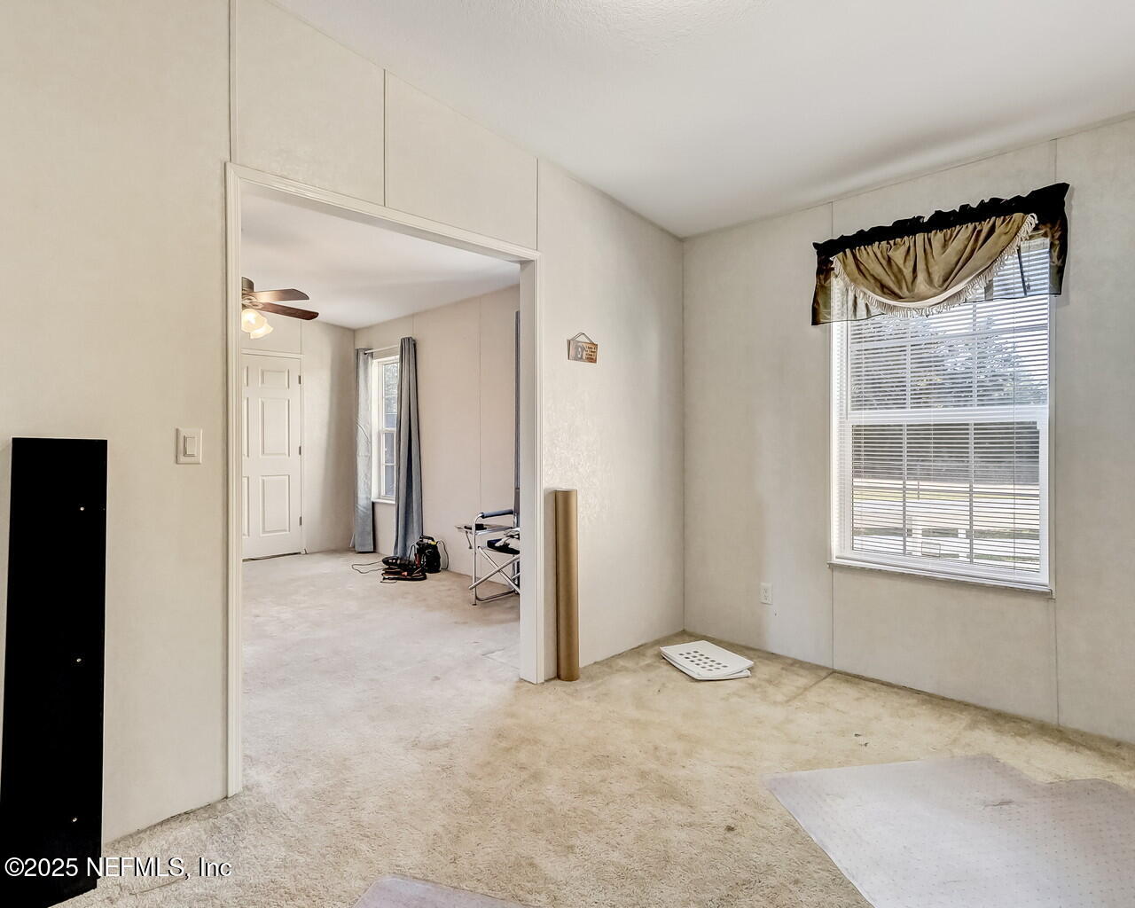 5891 Sequoia Road Keystone Heights, FL 32656 - Photo 42 of 53 an empty room with windows and closet