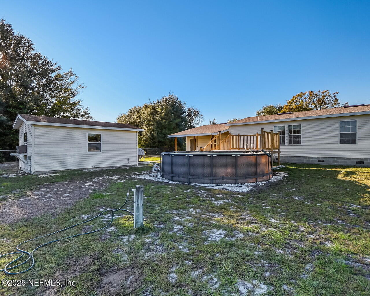 5891 Sequoia Road Keystone Heights, FL 32656 - Photo 44 of 53 a view of a house with a yard