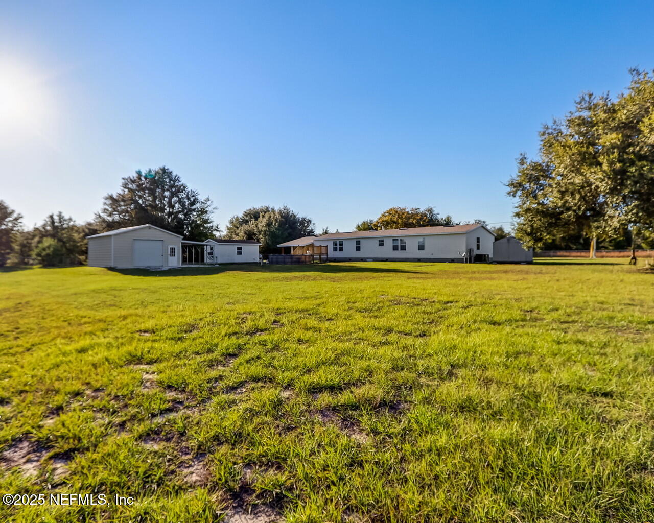 5891 Sequoia Road Keystone Heights, FL 32656 - Photo 49 of 53 a view of a swimming pool and an outdoor space