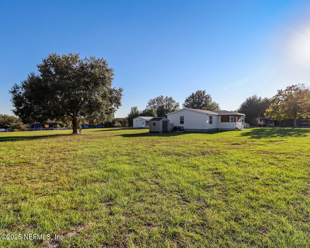 5891 Sequoia Road Keystone Heights, FL 32656 - Photo 52 of 53 a view of swimming pool with an outdoor space and seating area