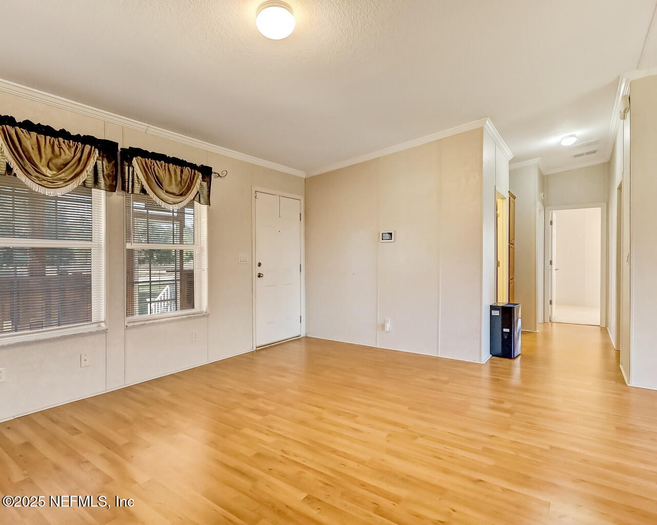 5891 Sequoia Road Keystone Heights, FL 32656 - Photo 9 of 53 a view of an empty room and window