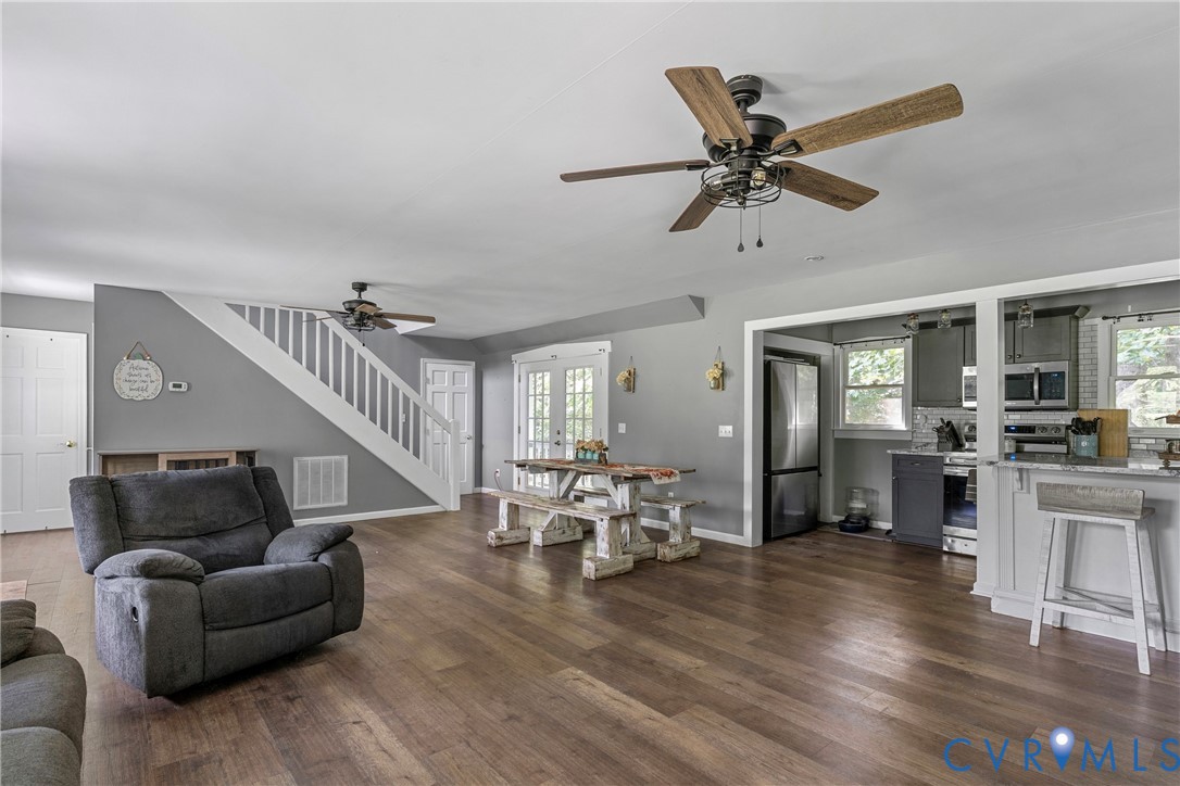 80 Mill Ridge Road Hartfield, VA 23071 - Photo 16 of 43 Open concept room with wood-finish flooring, two c