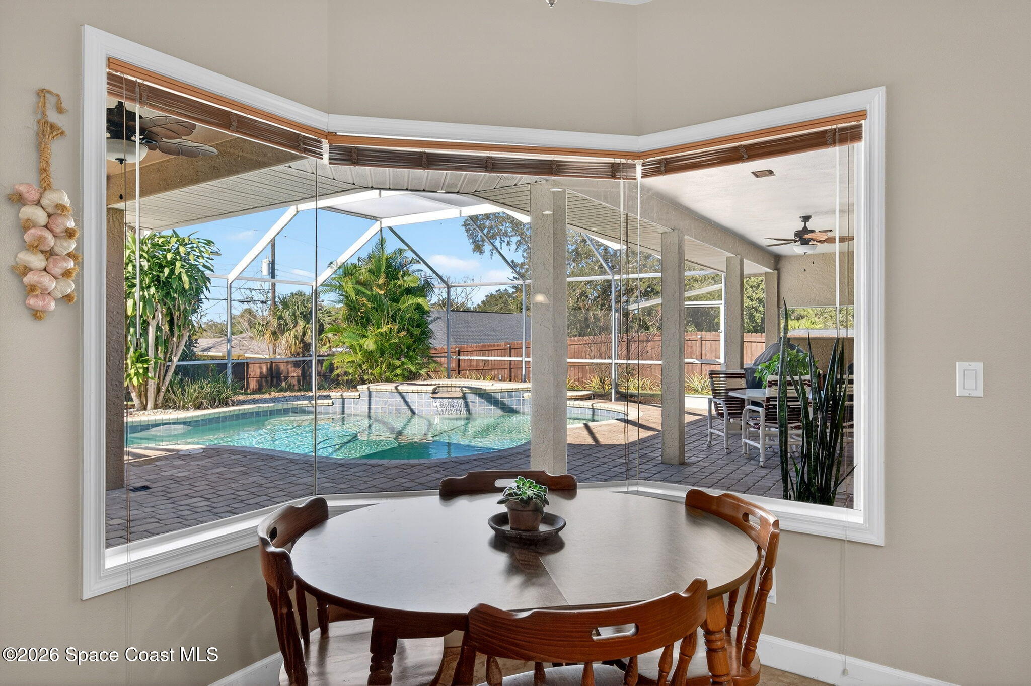 3676 South Ridge Circle Titusville, FL 32796 - Photo 17 of 74 a dining room with a table and chairs