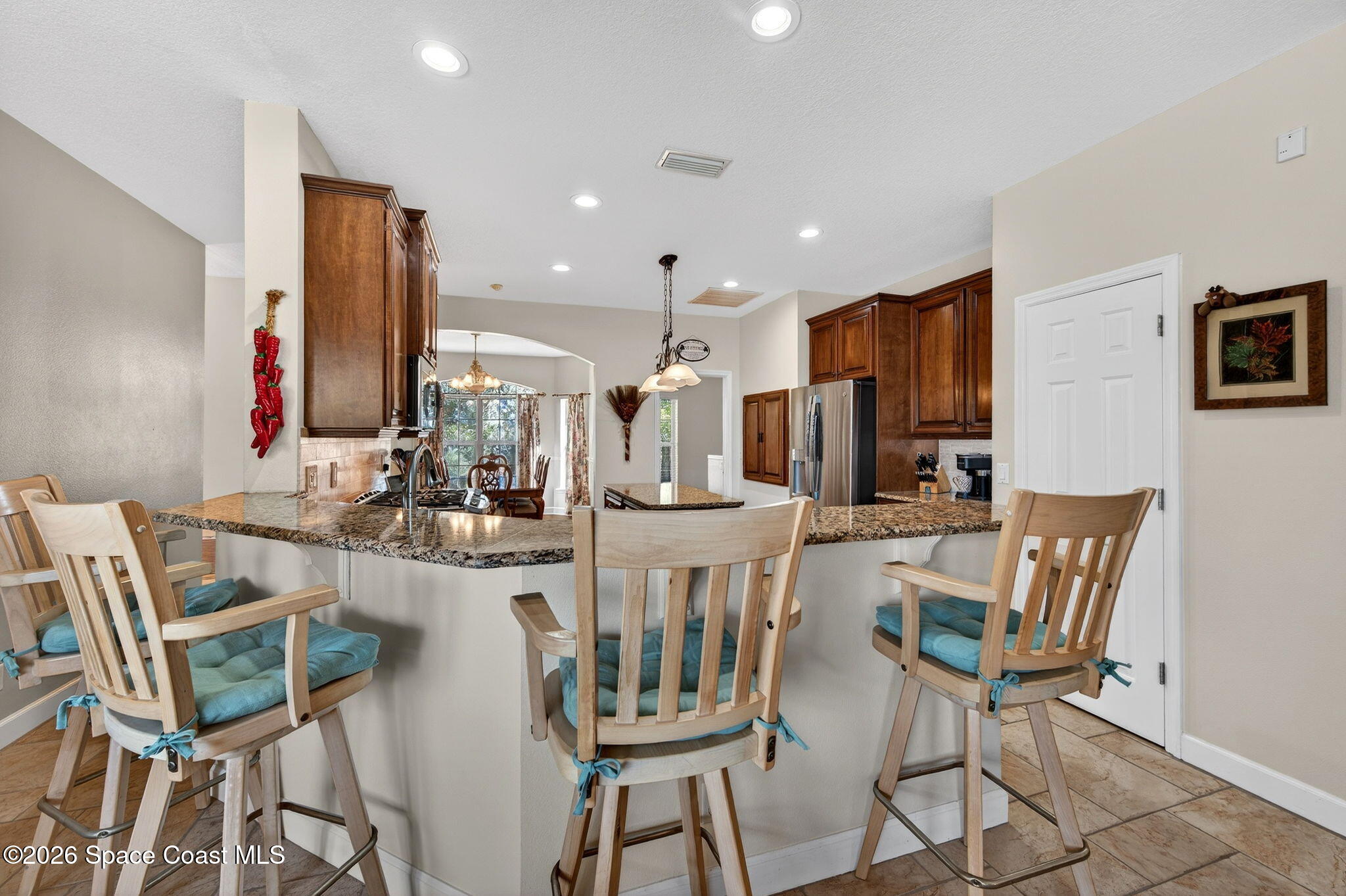 3676 South Ridge Circle Titusville, FL 32796 - Photo 20 of 74 a view of a dining room with furniture