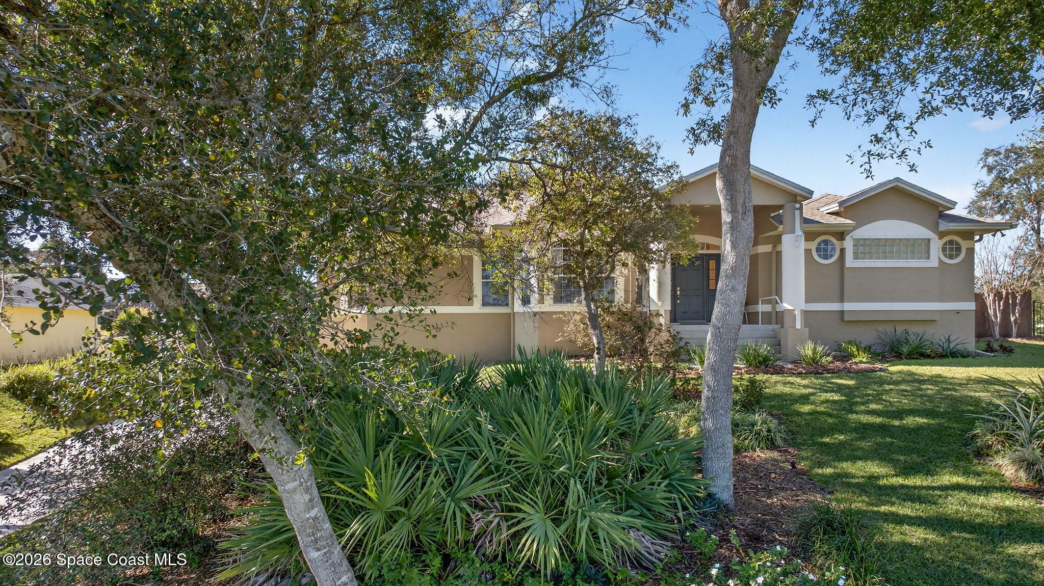 3676 South Ridge Circle Titusville, FL 32796 - Photo 2 of 74 a view of a house with a yard
