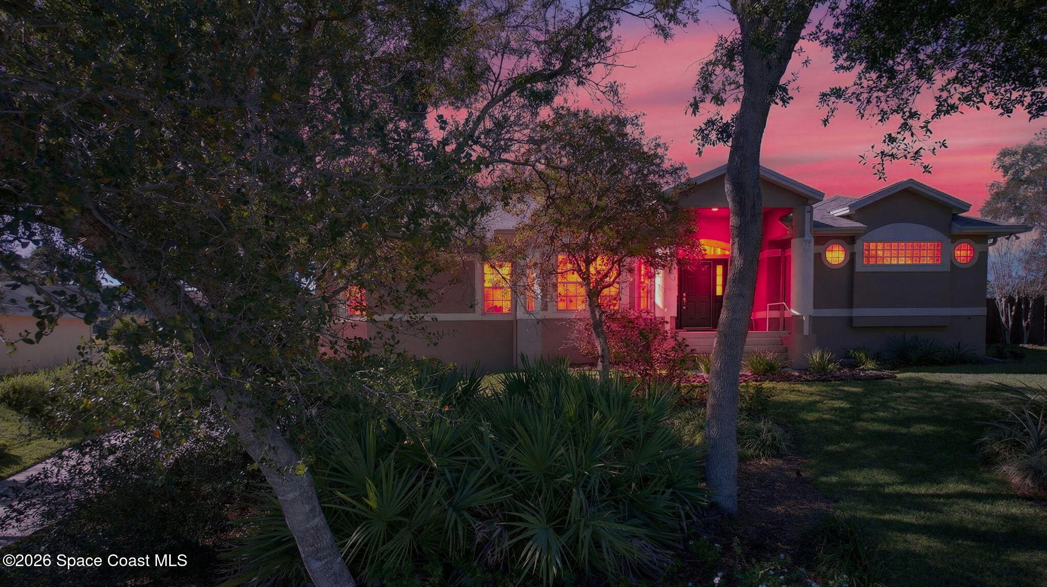 3676 South Ridge Circle Titusville, FL 32796 - Photo 3 of 74 a view of a house in a yard