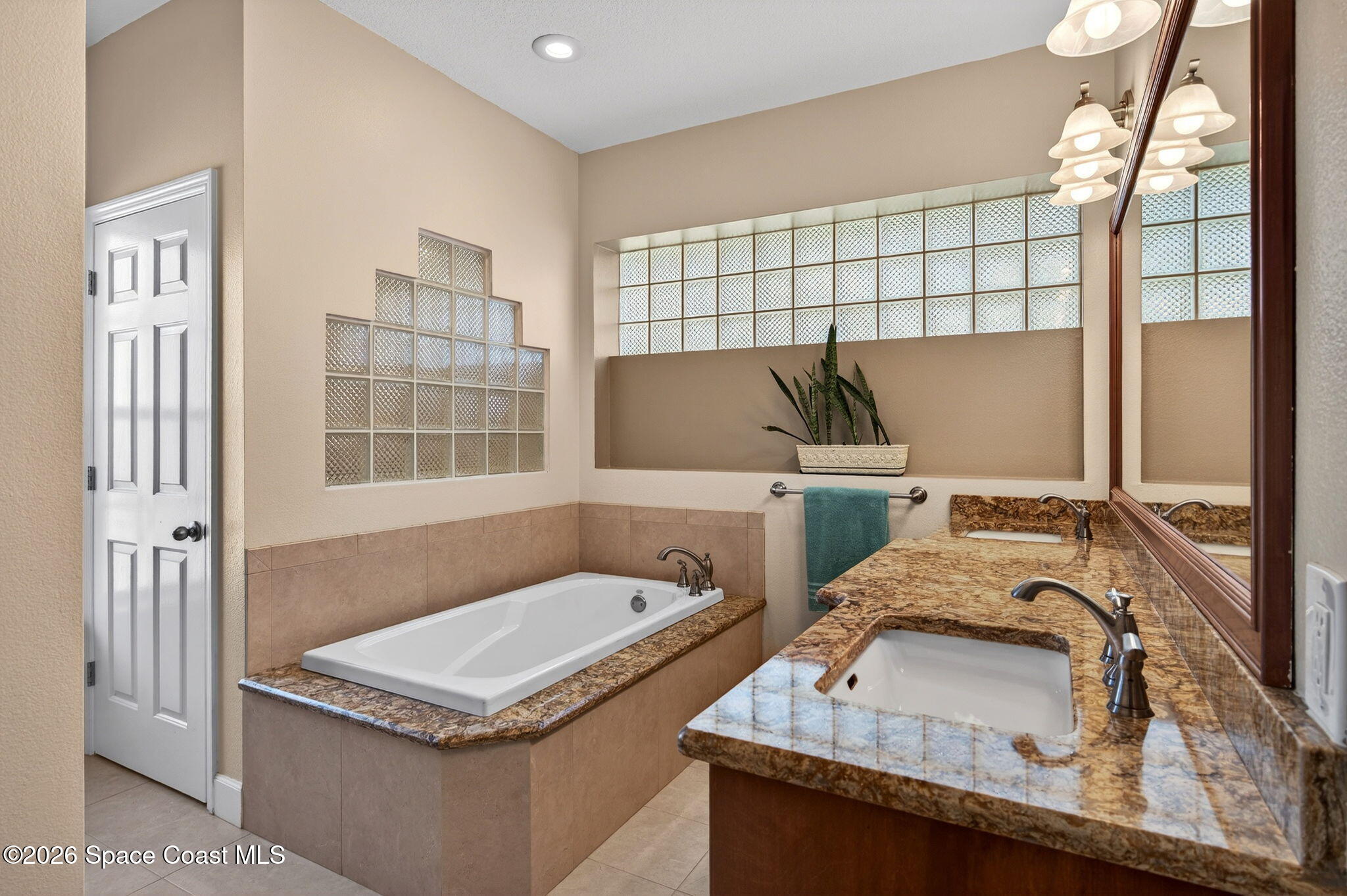 3676 South Ridge Circle Titusville, FL 32796 - Photo 33 of 74 a view of a sink a washer and dryer