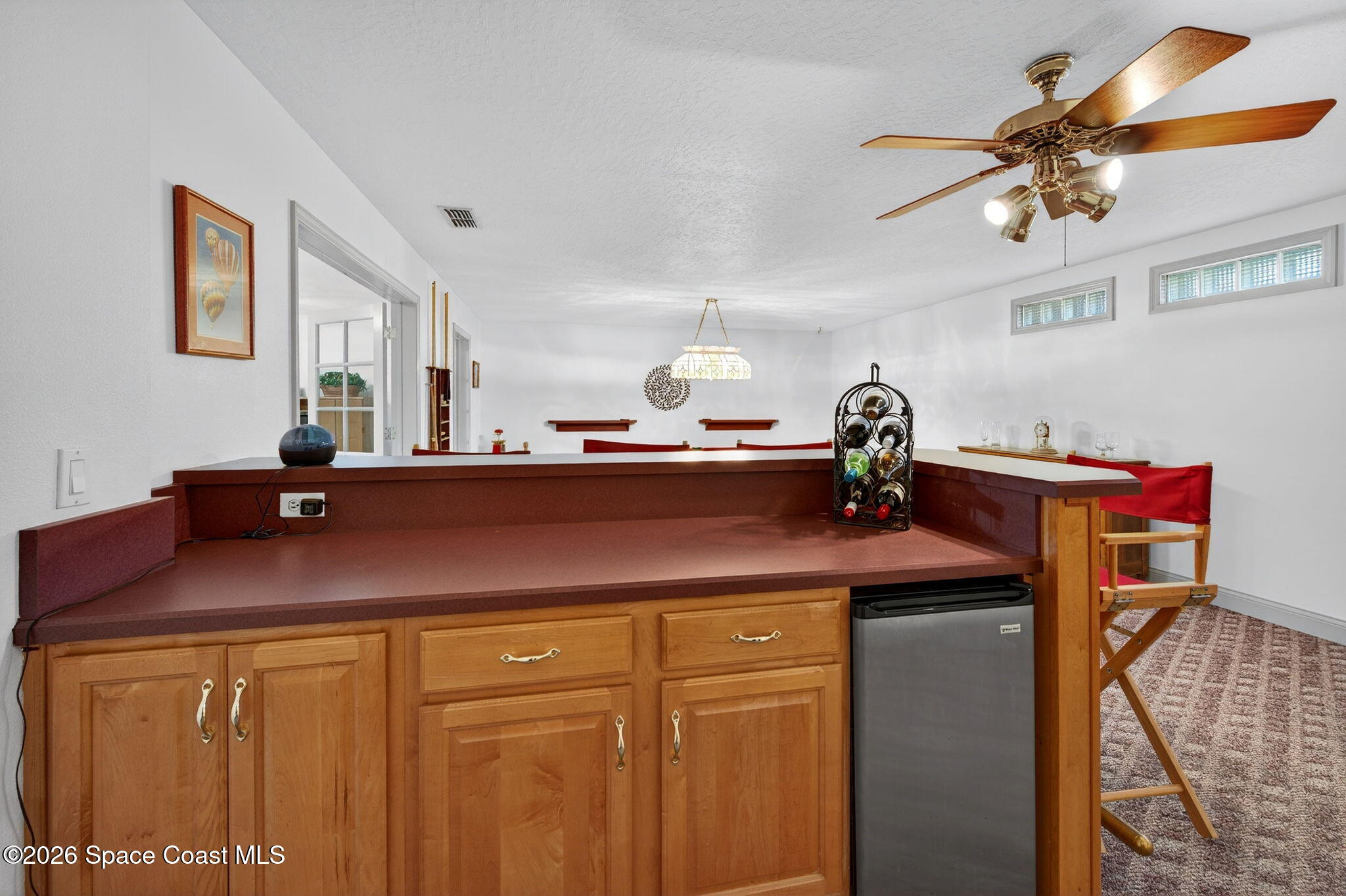 3676 South Ridge Circle Titusville, FL 32796 - Photo 57 of 74 a kitchen with a sink and cabinets