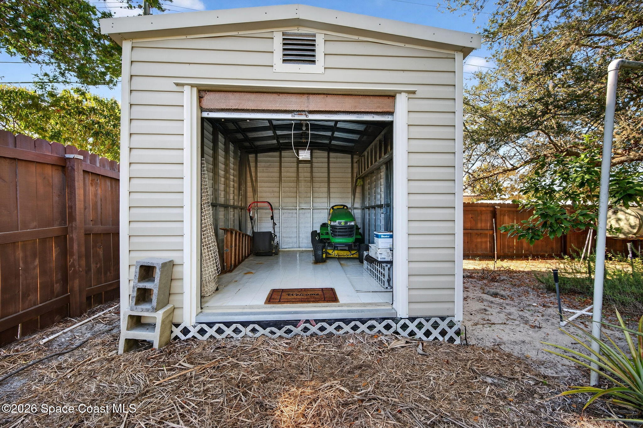 3676 South Ridge Circle Titusville, FL 32796 - Photo 61 of 74 a view of a entryway door front of house